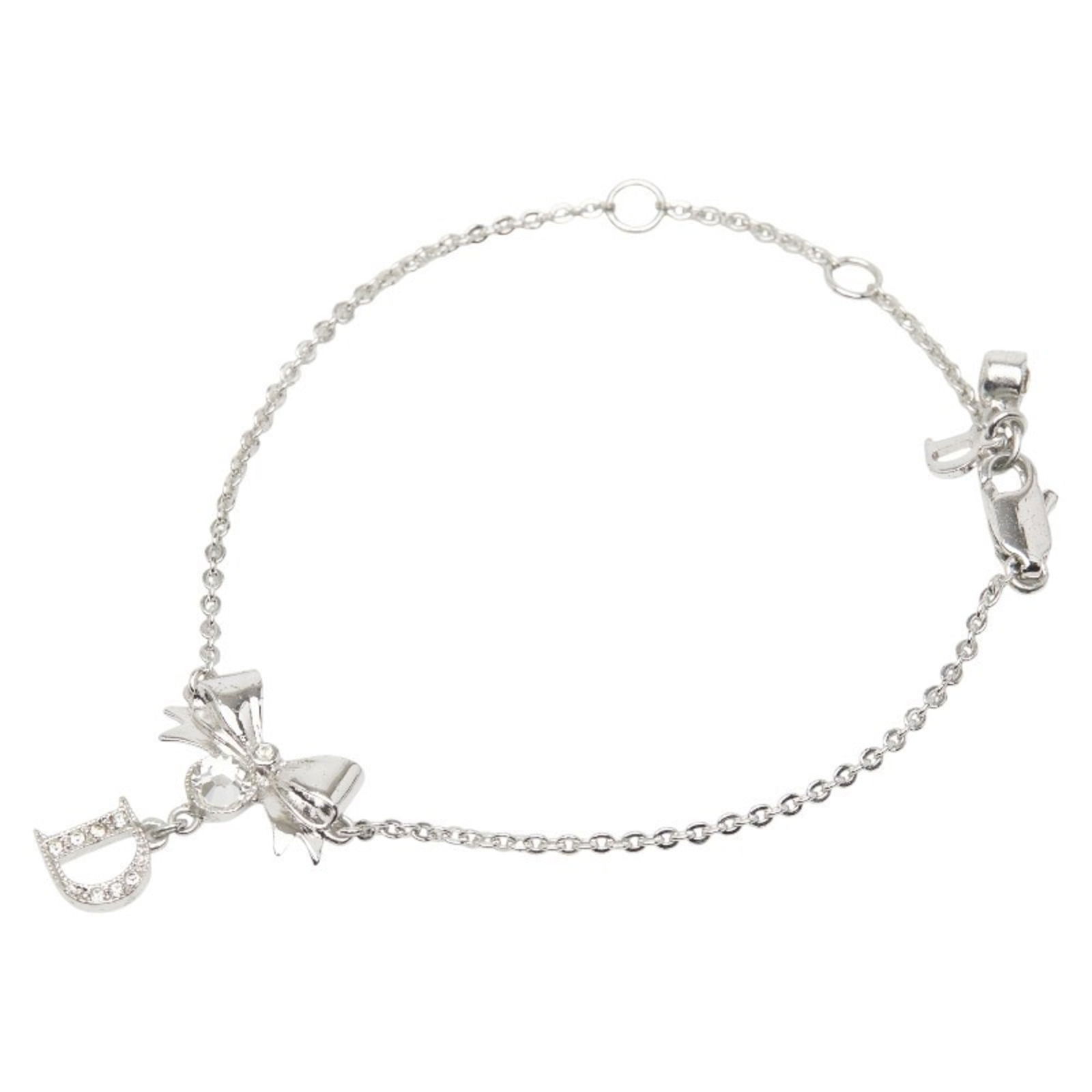 Metal Christian Dior Charm Bracelet: Metal Christian Dior Charm Bracelet Christian Dior charm bracelet for women, made of metal with rhinestones, measuring 19.5cm, showing good condition with visible traces of usage. Item Specifics: Bran