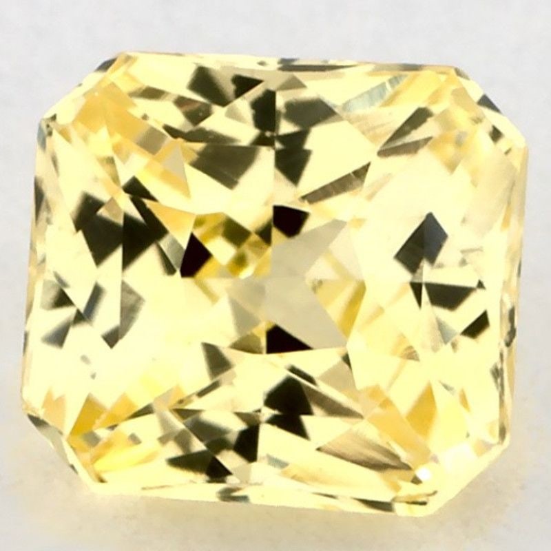 Loose Sapphire Gemstone 1.04ct Radiant Yellow EC: Loose Sapphire Gemstone 1.04ct Radiant Yellow EC This loose Sapphire gemstone weighs 1.04 carats with a radiant yellow color, EC clarity, and a faceted cut, measuring 5.48L x 5.03W mm, with no