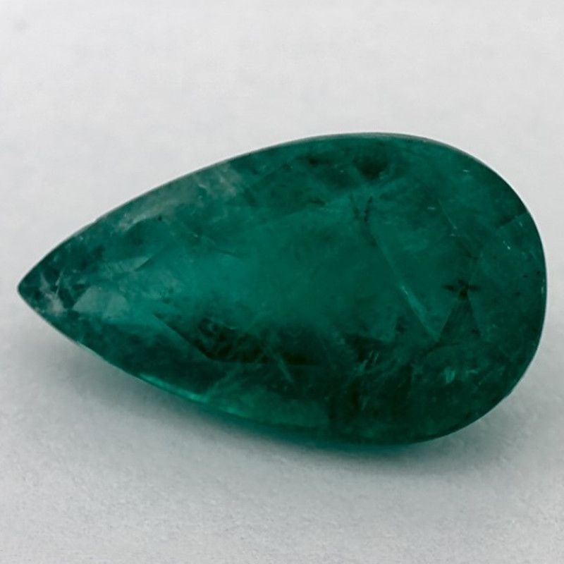 Loose Emerald Gemstone Pear 3.1ct Green SI: Loose Emerald Gemstone Pear 3.1ct Green SI This loose emerald gemstone weighs 3.1ct, is faceted with a green color, SI clarity, and has undergone oiling treatment. Item Specifics: Type: Emerald
