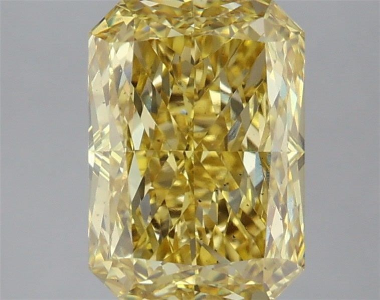 Loose Lab Diamond 3.02ct IGI Radiant Fancy Intense Yellow VS2: Loose Lab Diamond 3.02ct IGI Radiant Fancy Intense Yellow VS2 Loose lab-grown diamond, 2.06ct, cushion modified cut, color E, clarity VS1, with IGI certification. Measurements are 7.46 x 7.31 x 4.96