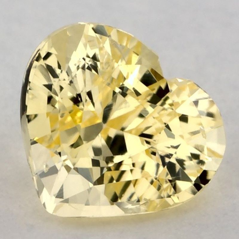 Loose Yellow SI Heart 1.56ct Sapphire Gemstone: Loose Yellow SI Heart 1.56ct Sapphire Gemstone Loose yellow sapphire gemstone weighing 1.56ct, heart cut with color yellow and clarity SI, untreated. Measurements are 6.36L x 7.24W. Item Specifics: