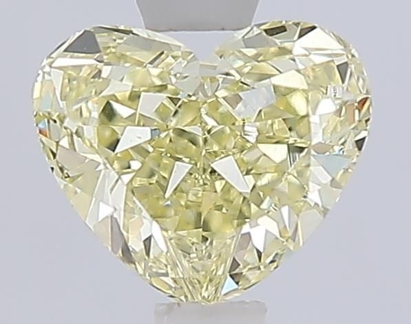 Loose Lab Diamond IGI Heart 1.09ct Fancy Yellow VVS2: Loose Lab Diamond IGI Heart 1.09ct Fancy Yellow VVS2 Loose lab-grown diamond, Heart cut, weighing 1.09 ct, Fancy Yellow color and VVS2 clarity, certified by IGI. Measurements are 5.94L x 7.06W x