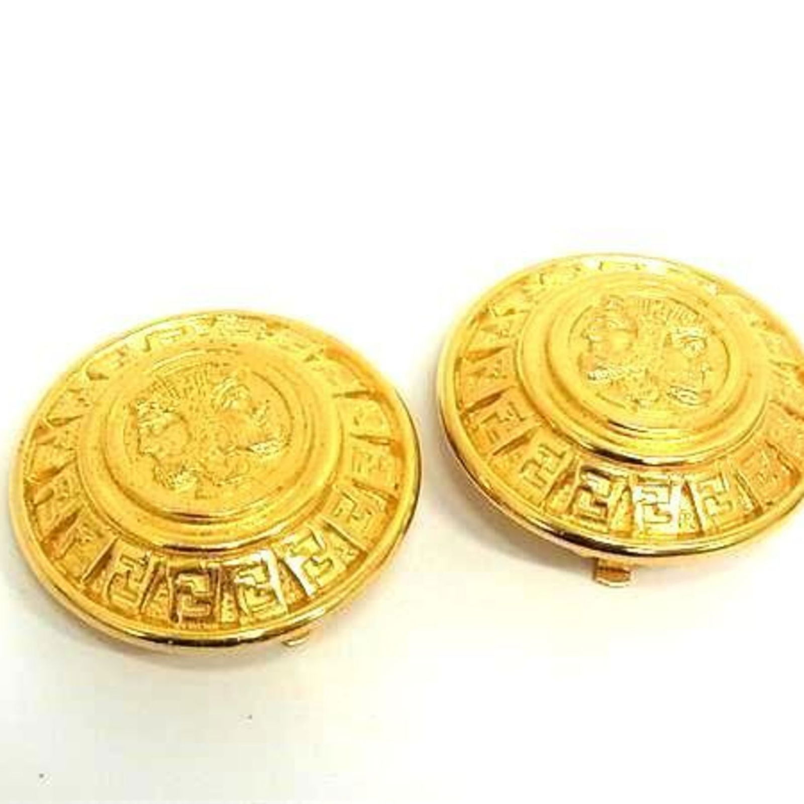 Fendi Metal Clip Earrings: Fendi Metal Clip Earrings Fendi fashion clip earrings made of metal in gold color, measuring 30mm x 30mm, in very good used condition with minor signs of wear. Item Specifics: Brand: Fendi Type: Clip