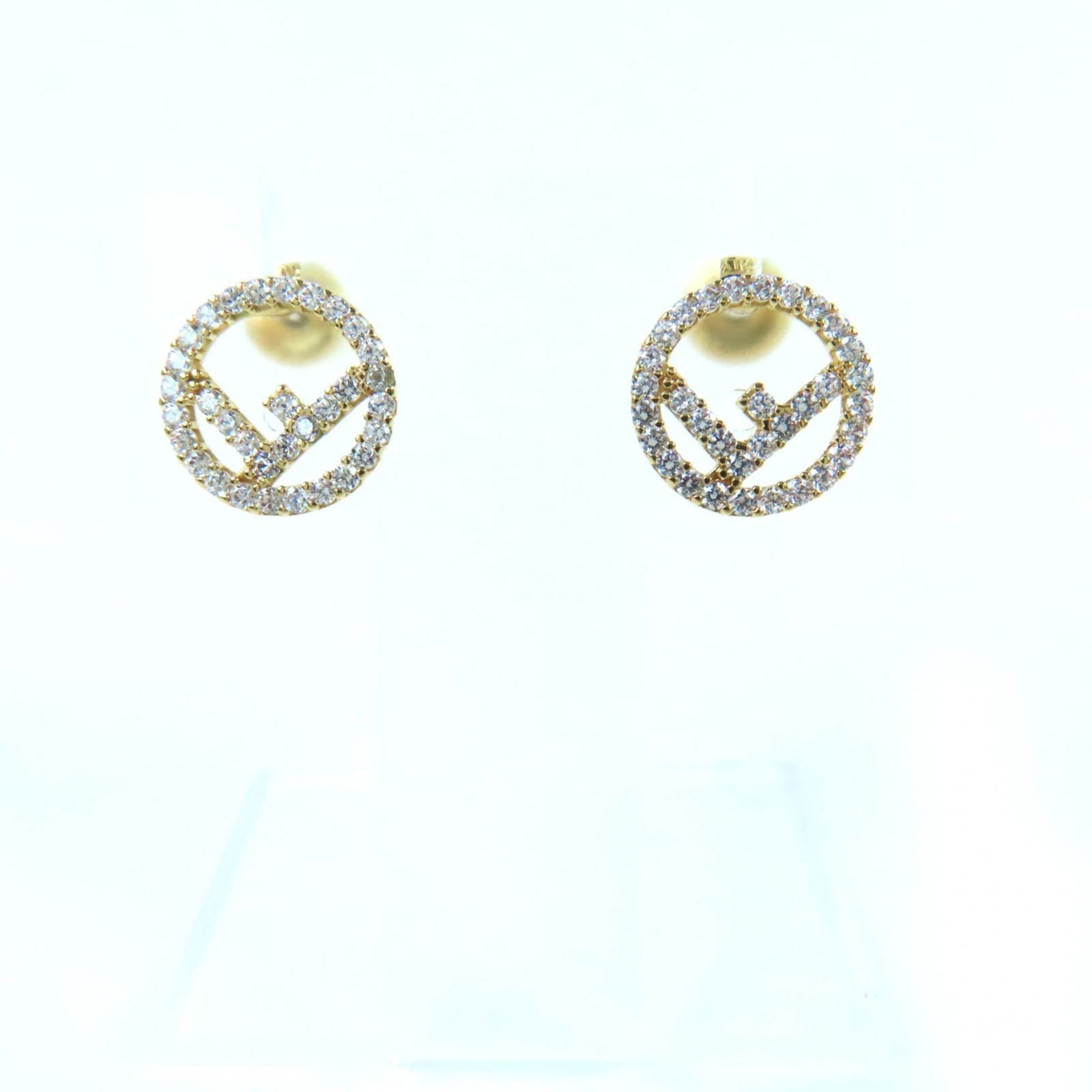 Earrings Fendi Stud: Earrings Fendi Stud Fendi gold stud earrings for women, adorned with crystals and measuring 10mm in diameter, in like-new condition. Item Specifics: Brand: Fendi Type: Stud Earrings Gender: Women Colo