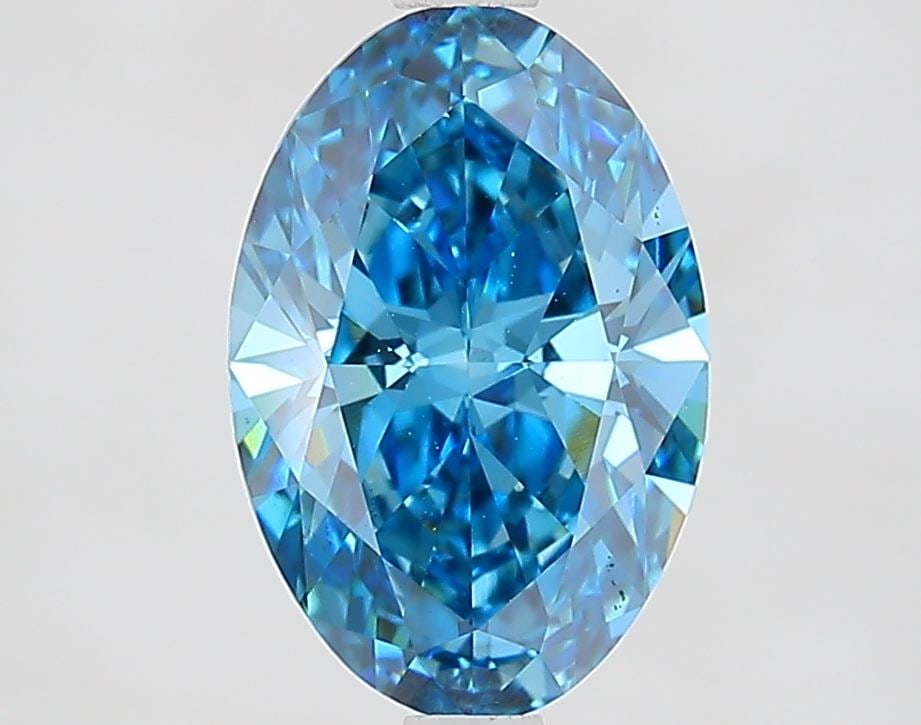 Loose Lab Diamond IGI Oval 2.09ct Fancy Vivid Blue VS1: Loose Lab Diamond IGI Oval 2.09ct Fancy Vivid Blue VS1 Loose lab-grown diamond weighing 2.09ct, featuring a Fancy Vivid Blue color and VS1 clarity, certified by IGI. Measurements are 10.66L x 7.11W x