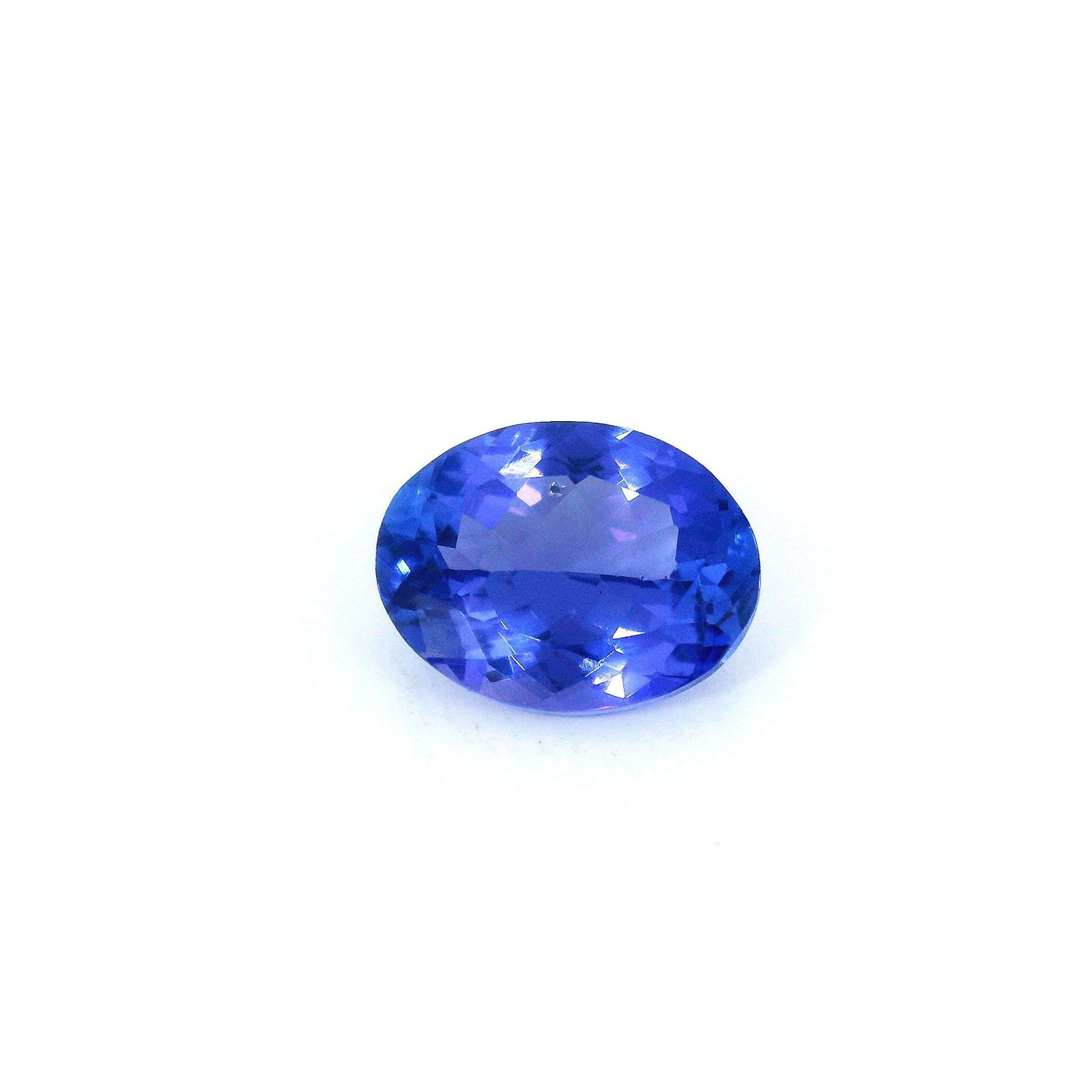 Loose Tanzanite Gemstone GSI Oval 1.97ct Blue EC: Loose Tanzanite Gemstone GSI Oval 1.97ct Blue EC This loose tanzanite gemstone, graded by GSI, weighs 1.97 carats, is faceted, has a violetish blue color with EC clarity, and measures 9.0L x 7.04W. 