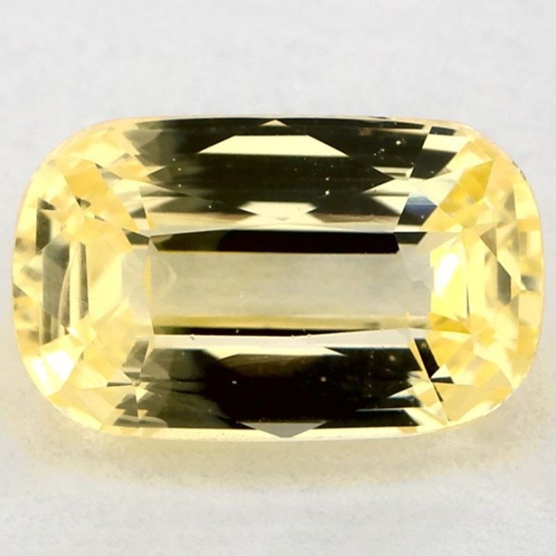 Loose Yellow Sapphire Gemstone 2.49ct Cushion EC: Loose Yellow Sapphire Gemstone 2.49ct Cushion EC A loose yellow sapphire gemstone, weighing 2.49ct, with EC clarity and no treatments, showcasing a yellow shade. Item Specifics: Type: Sapphire Carat: