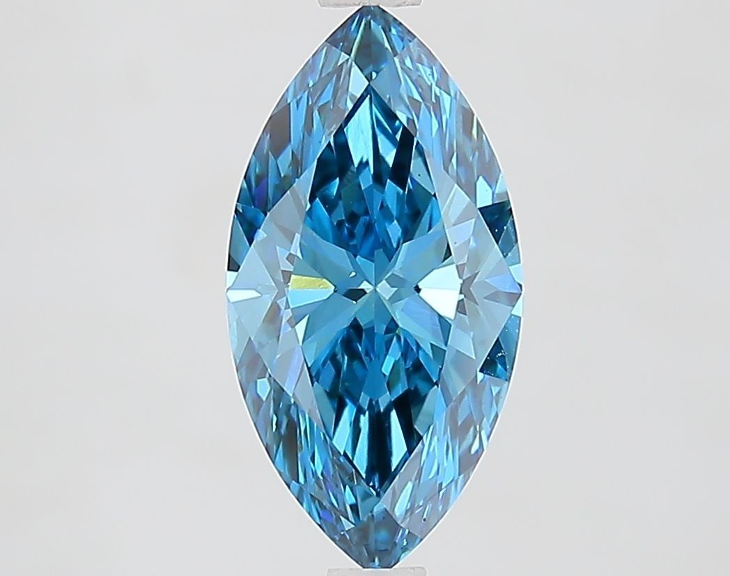 Loose Lab Diamond IGI Marquise 1.82ct Fancy Vivid Blue VS1: Loose Lab Diamond IGI Marquise 1.82ct Fancy Vivid Blue VS1 This 1.82ct Loose Lab Diamond, certified by IGI, boasts a fancy vivid blue color and VS1 clarity. It measures 12.33mm x 6.3mm x 3.93mm and is