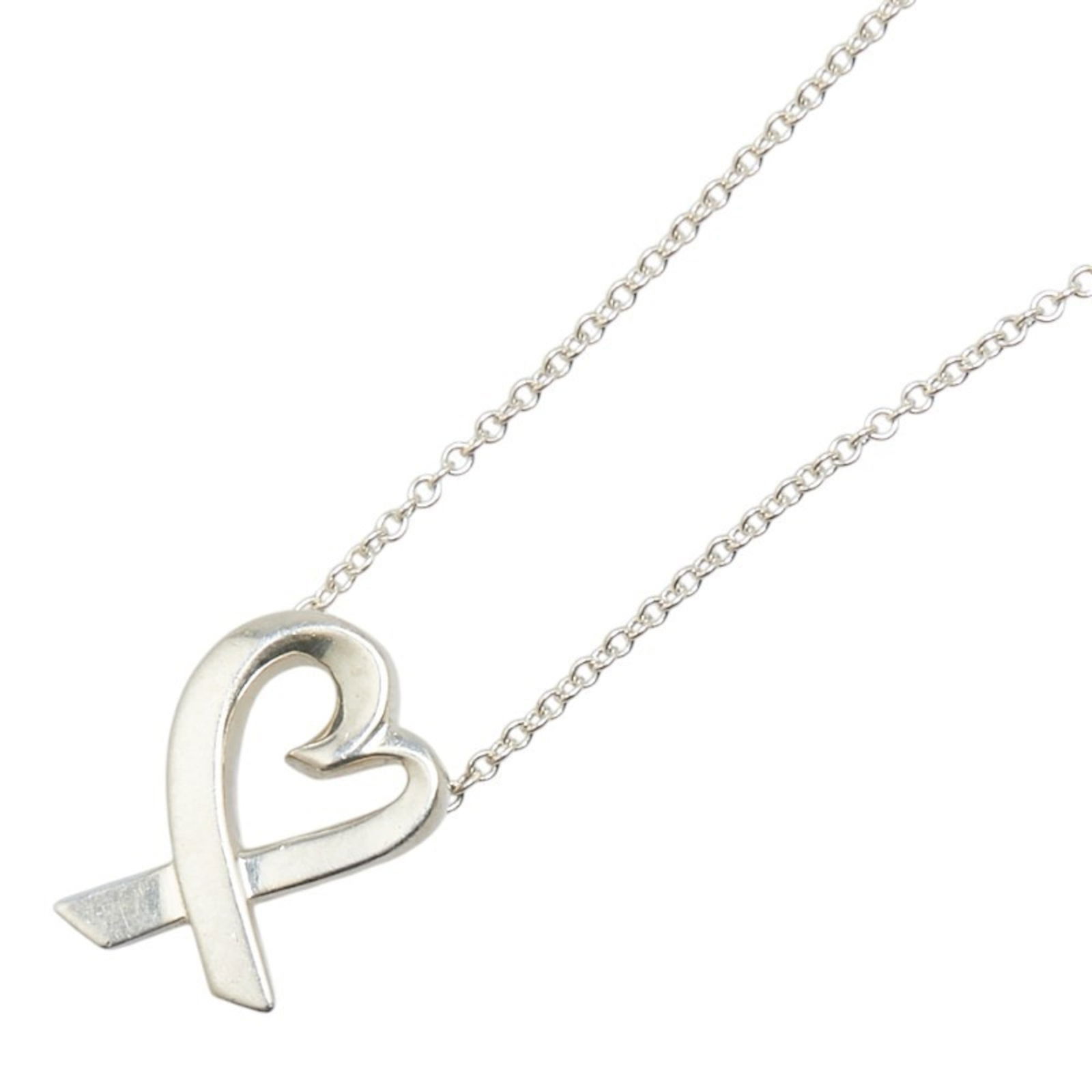 Silver 925 Tiffany: Silver 925 Tiffany The Tiffany Silver 925 Necklace for women has a neck circumference of 42 cm and features a pendant size of 14.8mm x 10.6mm; it is in good used condition. Item Specifics: Brand: