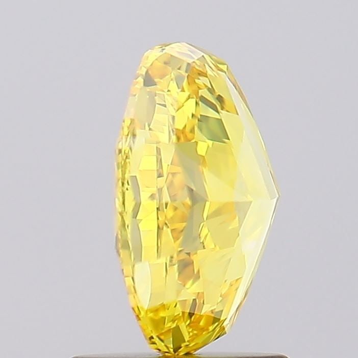 Loose IGI Oval 1.53ct Fancy Vivid Yellow VVS2 Lab Diamond: Loose IGI Oval 1.53ct Fancy Vivid Yellow VVS2 Lab Diamond Loose IGI certified oval lab diamond weighing 1.53ct, fancy vivid yellow color, and VVS2 clarity. It features excellent polish and symmetry,