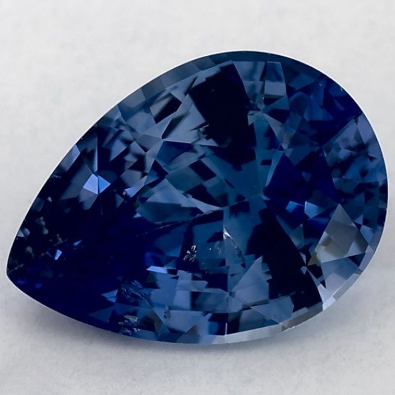 Loose Sapphire Gemstone Pear 2.8ct Blue SI: Loose Sapphire Gemstone Pear 2.8ct Blue SI Loose Sapphire gemstone weighing 2.8ct with a pear cut, blue color, and SI clarity; heated treatment with measurements of 10.57L X 7.71W. Item Specifics: