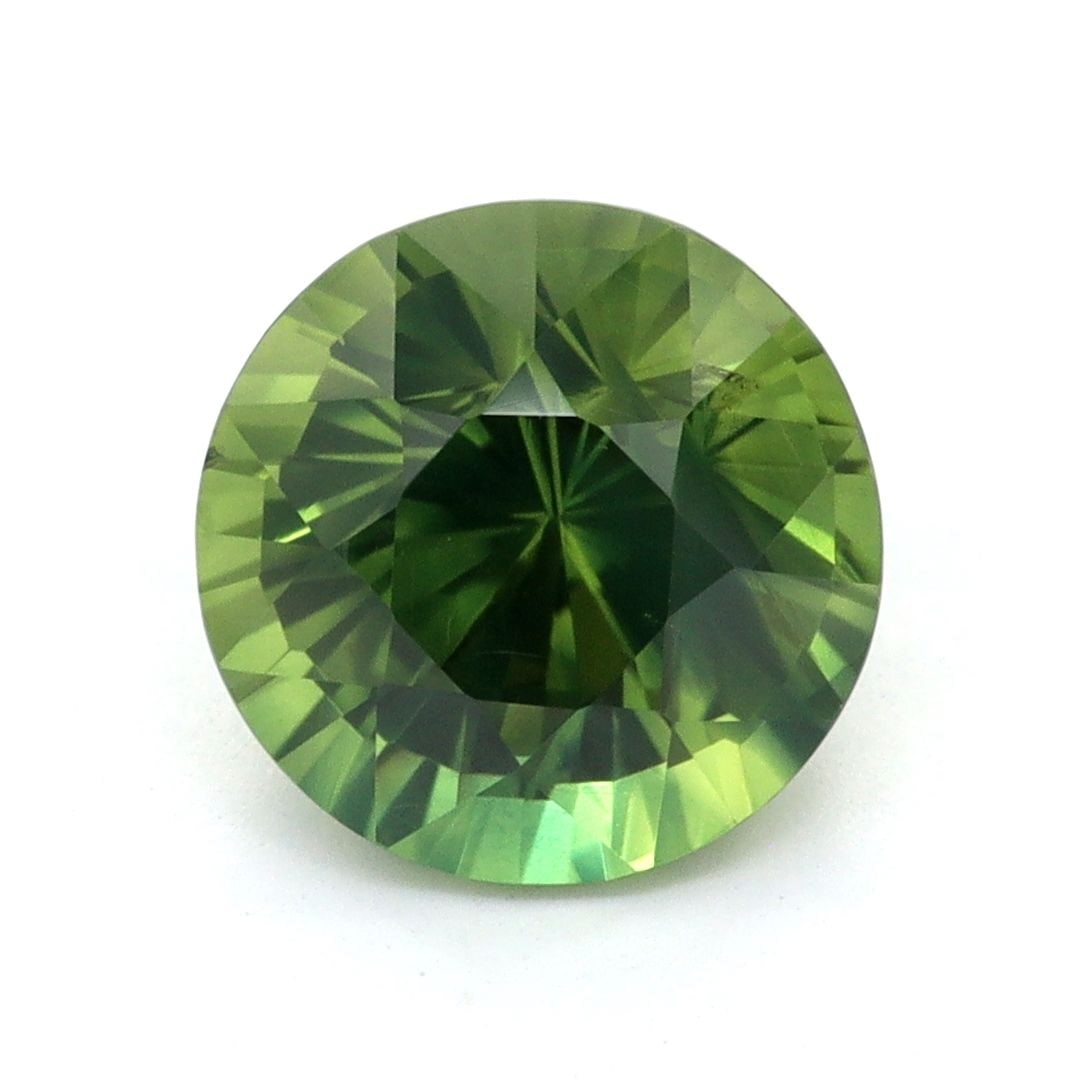Loose Sapphire Gemstone Round 1.74ct Green EC: Loose Sapphire Gemstone Round 1.74ct Green EC Loose round sapphire gemstone weighing 1.74ct, heat-treated, with a faceted cut, green color, and measurements of 6.95L x 6.9W. Item Specifics: Type: