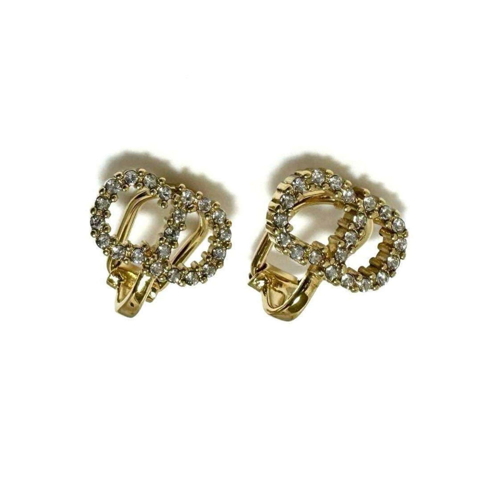 Christian Dior Metal Clip Earrings with Rhinestone: Christian Dior Metal Clip Earrings with Rhinestone Loose Emerald Gemstone weighing 1.25ct with a faceted cut, green color, SI clarity, treated with oiling, measures 8.05L x 6.0W, un-certified. Item