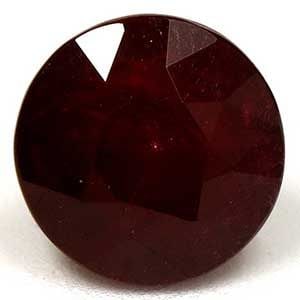 Loose Ruby Gemstone Round 1.16ct Red SI: Loose Ruby Gemstone Round 1.16ct Red SI This loose round ruby gemstone weighs 1.16ct, is faceted with a deep red color and SI clarity. It has been heated and its dimensions are 5.77mm x 5.77mm. Item S