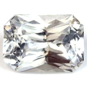 Loose Sapphire Gemstone 1.71ct White SI - Emerald: Loose Sapphire Gemstone 1.71ct White SI - Emerald Loose white sapphire gemstone weighing 1.71ct with SI clarity and no treatment, featuring an emerald cut with measurements of 7.63L x 5.54W mm. Item S