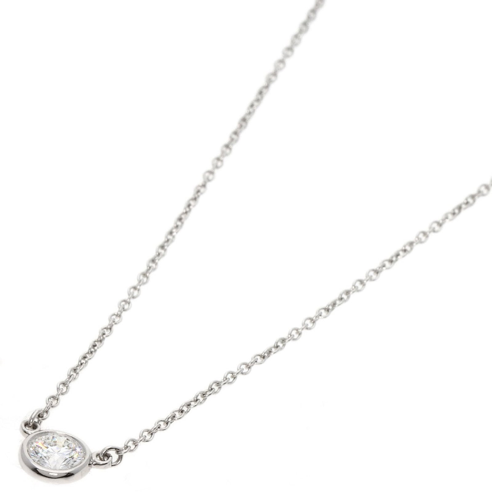 950 Tiffany Platinum: 950 Tiffany Platinum Used Tiffany necklace in 950 platinum for women, featuring a diamond pendant, 41 cm neck circumference, and in very good condition. Item Specifics: Brand: Tiffany Necklace Type: N
