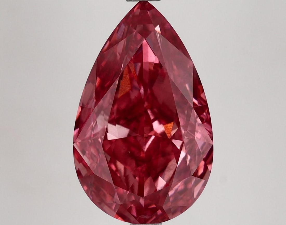 Loose Lab Diamond IGI Pear 5.0ct Fancy Vivid Pink VS2: Loose Lab Diamond IGI Pear 5.0ct Fancy Vivid Pink VS2 Loose 5.0ct pear-shaped lab-grown diamond in fancy vivid pink, VS2 clarity, exhibiting excellent polish and symmetry; measures 14.56L x 9.0W x