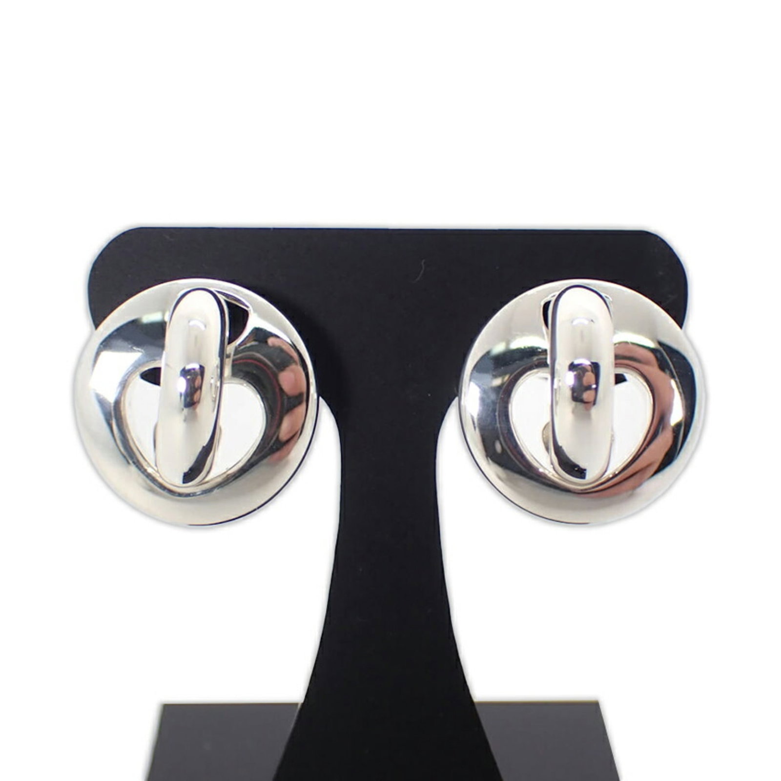 Sterling Silver 925 Tiffany Stud Earrings: Sterling Silver 925 Tiffany Stud Earrings These Tiffany stud earrings are made of sterling silver 925, measuring 14.00mm x 14.00mm. They are in very good used condition with some minor signs of wear.