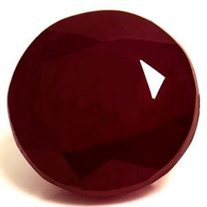 Loose Ruby Gemstone 2.07ct Red SI - GIA Round: Loose Ruby Gemstone 2.07ct Red SI - GIA Round Loose ruby gemstone weighing 2.07ct with a deep red color and SI clarity, certified by GIA, featuring a faceted cut with measurements of 7.07L x 6.93W. It