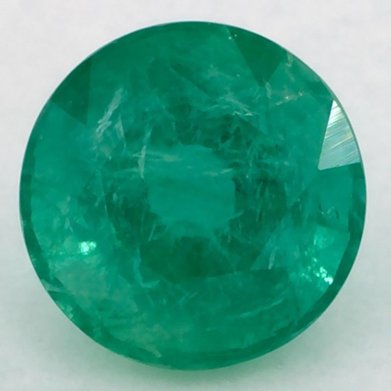 Loose Round 1.75ct Green SI Emerald Gemstone: Loose Round 1.75ct Green SI Emerald Gemstone Loose Emerald 1.76ct Green SI Garnet Gemstone, measuring 5.3L x 5.8W, is a faceted forest green garnet with SI clarity and no treatment. Item Specifics: