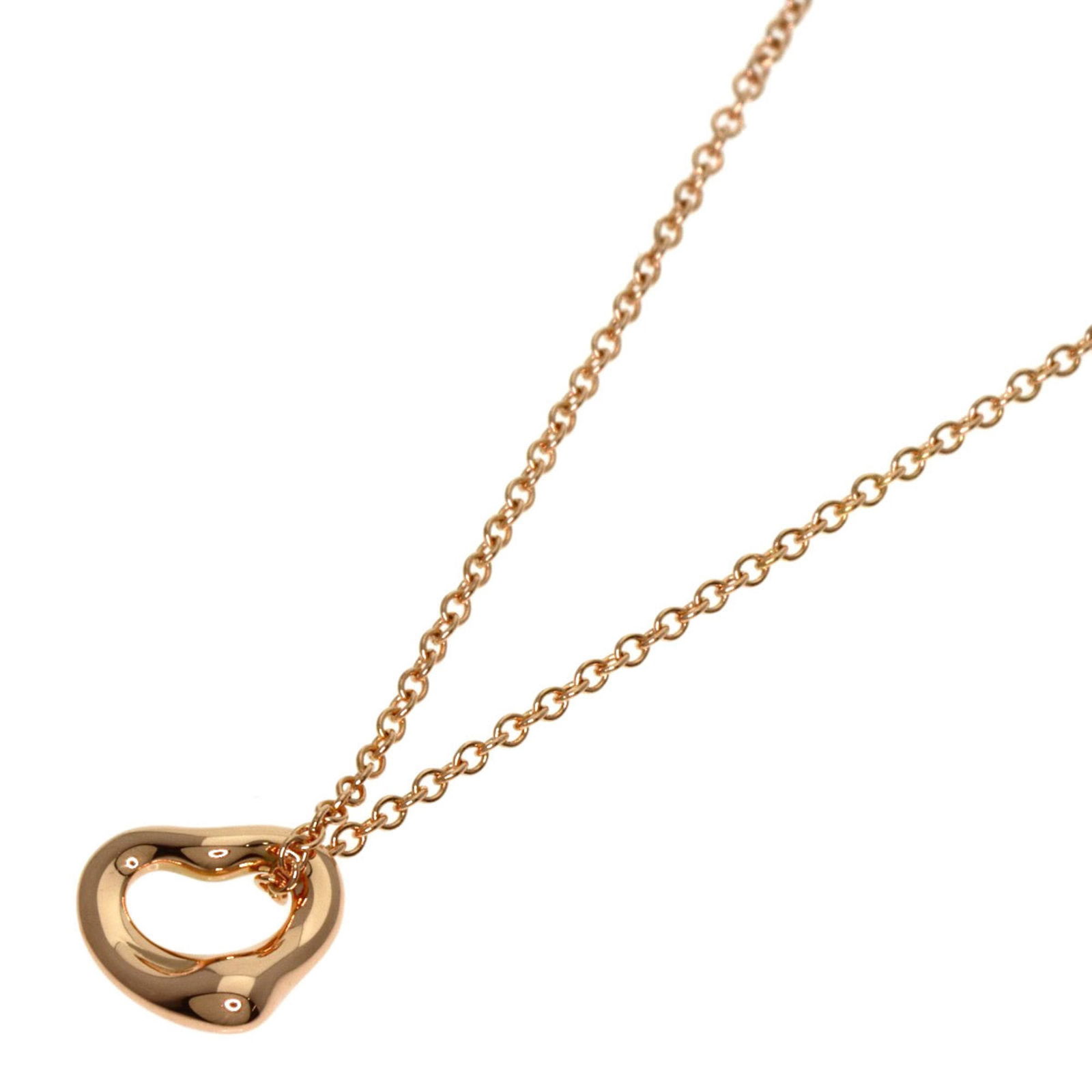 Pink Gold (18K) Tiffany: Pink Gold (18K) Tiffany 18K Pink Gold Tiffany Necklace with a neck circumference of 41 cm and a pendant size of 6.3mm x 6.9mm, in very good used condition. Item Specifics: Brand: Tiffany Necklace Type