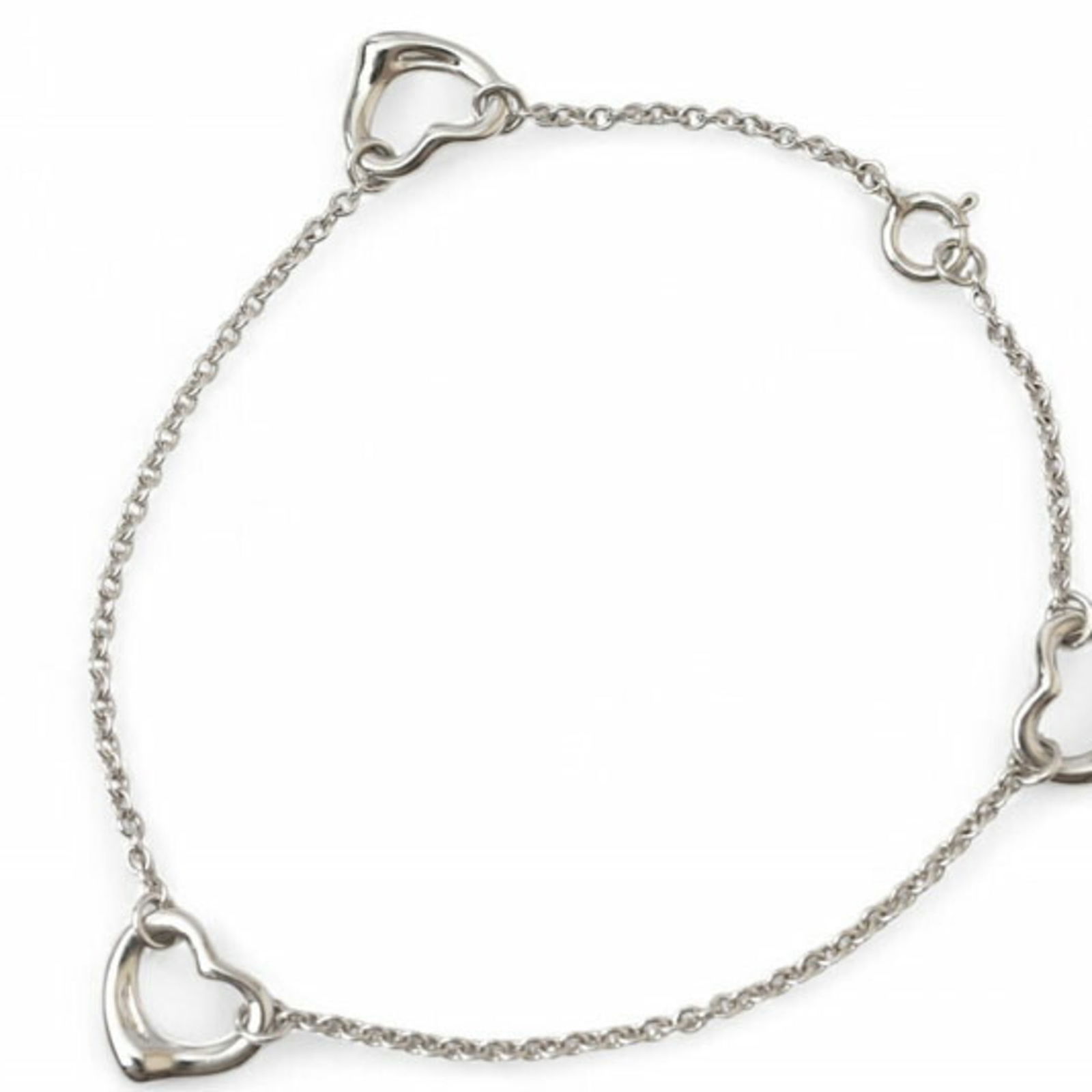 Tiffany Silver 925 Charm Bracelet: Tiffany Silver 925 Charm Bracelet Tiffany charm bracelet made of Silver 925, measuring 18cm in total length with a charm size of 1cm x 1cm, in good used condition. Item Specifics: Brand: Tiffany