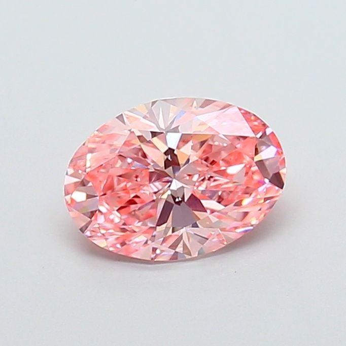 Loose Lab Diamond 1.56ct Fancy Vivid Pink VS1 - IGI Oval: Loose Lab Diamond 1.56ct Fancy Vivid Pink VS1 - IGI Oval Loose 1.56 carat lab-grown diamond in an oval cut with a fancy vivid pink color and clarity VS1, featuring excellent polish and good symmetry;