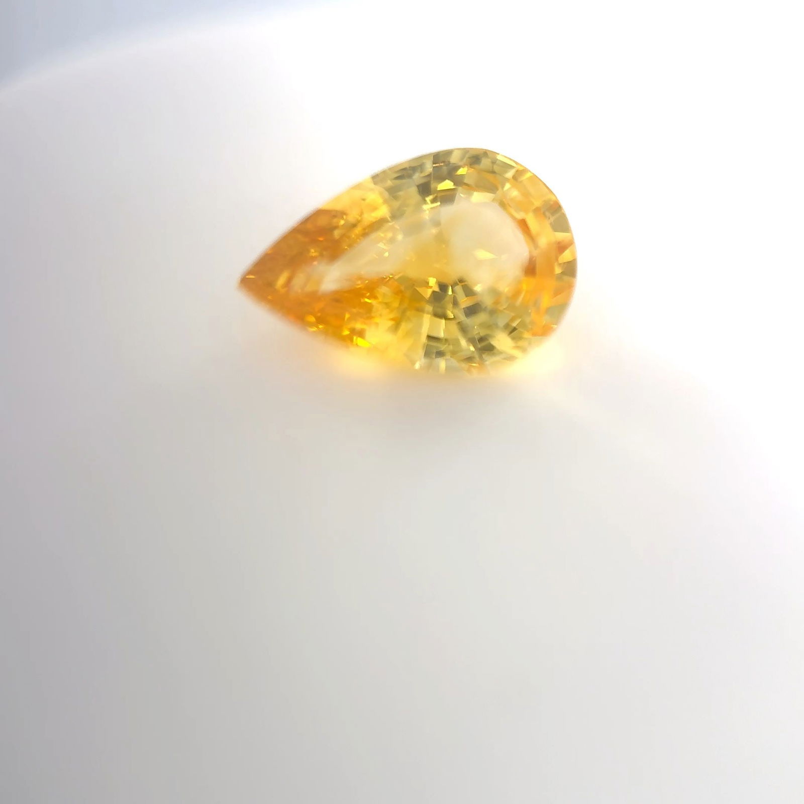 Loose Sapphire Gemstone Pear 2.06ct Yellow EC: Loose Sapphire Gemstone Pear 2.06ct Yellow EC Loose sapphire gemstone, faceted, 2.06ct, vivid medium yellow color, with EC clarity and heated treatment; dimensions 10.05L x 6.73W. Item Specifics: