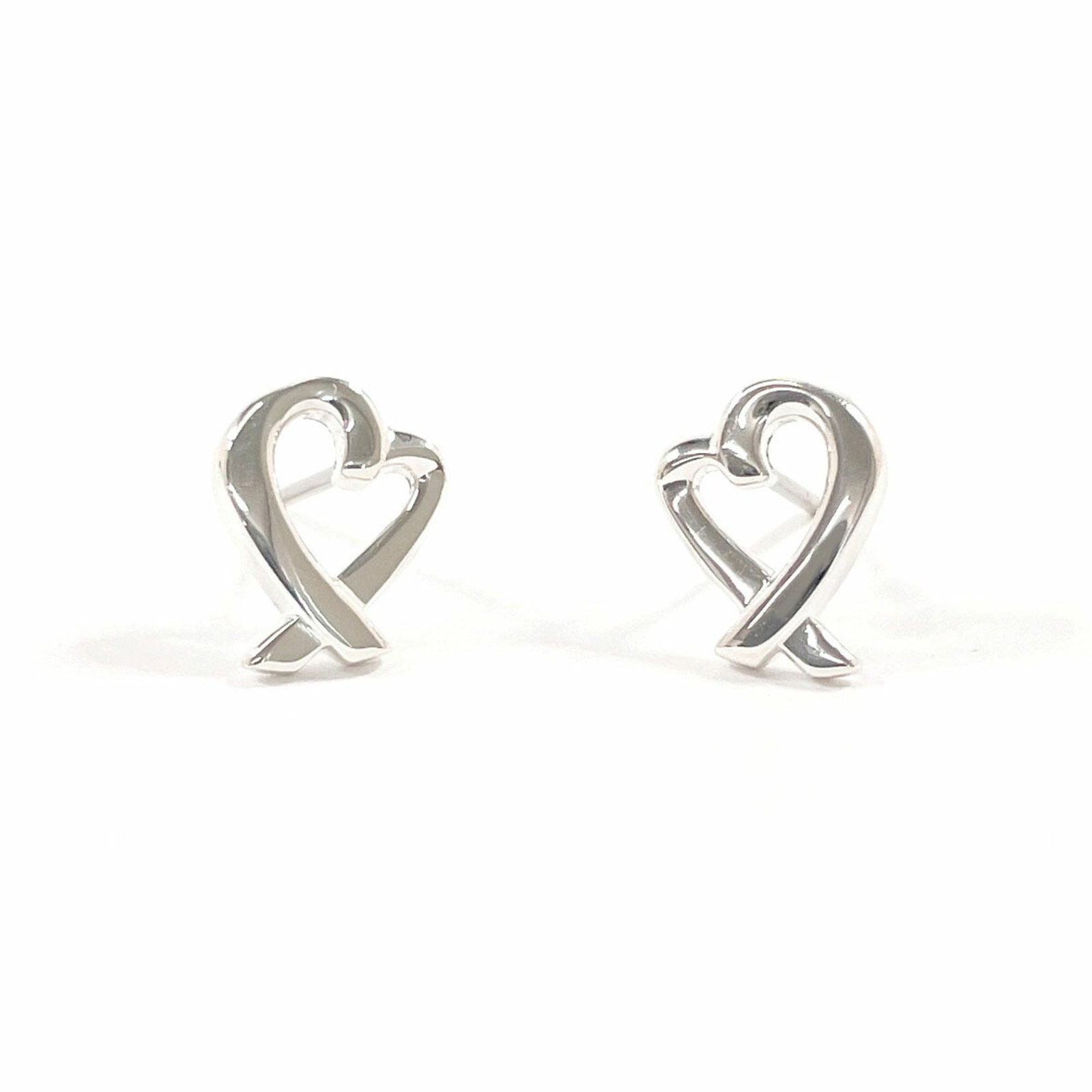 Tiffany Silver 925 Stud Earrings: Tiffany Silver 925 Stud Earrings Tiffany stud earrings made from Silver 925 designed for women, in like new condition with minimal traces of wear. Item Specifics: Brand: Tiffany Type: Stud Earrings