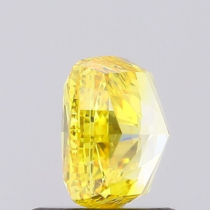 Loose Lab Diamond IGI Cushion Modified 1.12ct Fancy Vivid Yellow VVS2: Loose Lab Diamond IGI Cushion Modified 1.12ct Fancy Vivid Yellow VVS2 Loose Lab Diamond weighing 1.12ct, cushion modified cut with a fancy vivid yellow color and VVS2 clarity, measures 5.81L x 5.36W