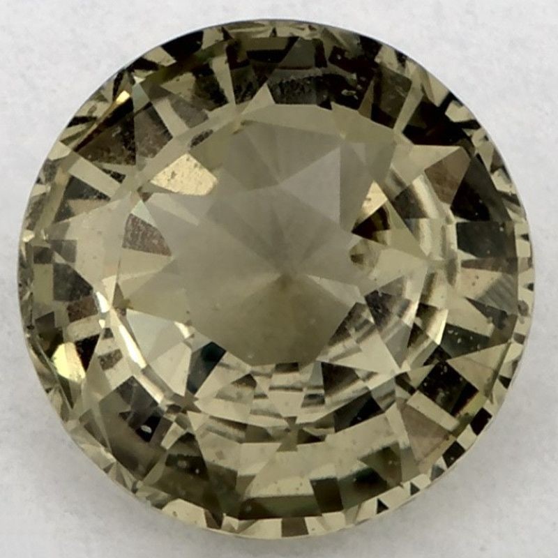 Loose Sapphire Gemstone Round 1.85ct Green SI: Loose Sapphire Gemstone Round 1.85ct Green SI Loose faceted green sapphire gemstone, 1.85ct with SI clarity, heated treatment, and measurements of 7.33L x 7.33W mm. Item Specifics: Type: Sapphire