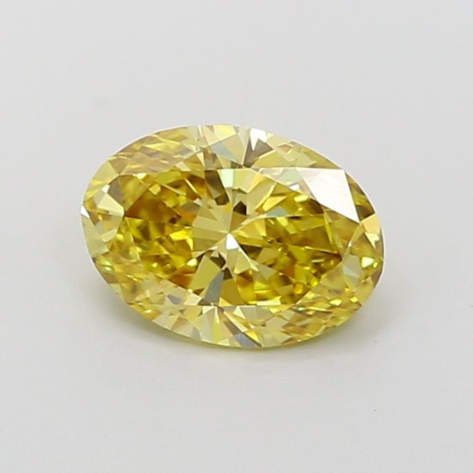 Loose Lab Diamond Oval 1.06ct Fancy Vivid Yellow VVS2: Loose Lab Diamond Oval 1.06ct Fancy Vivid Yellow VVS2 Loose lab-grown diamond weighing 1.06ct, characterized as fancy vivid yellow with VVS2 clarity, measuring 8.02L x 5.7W x 3.52H mm, with no