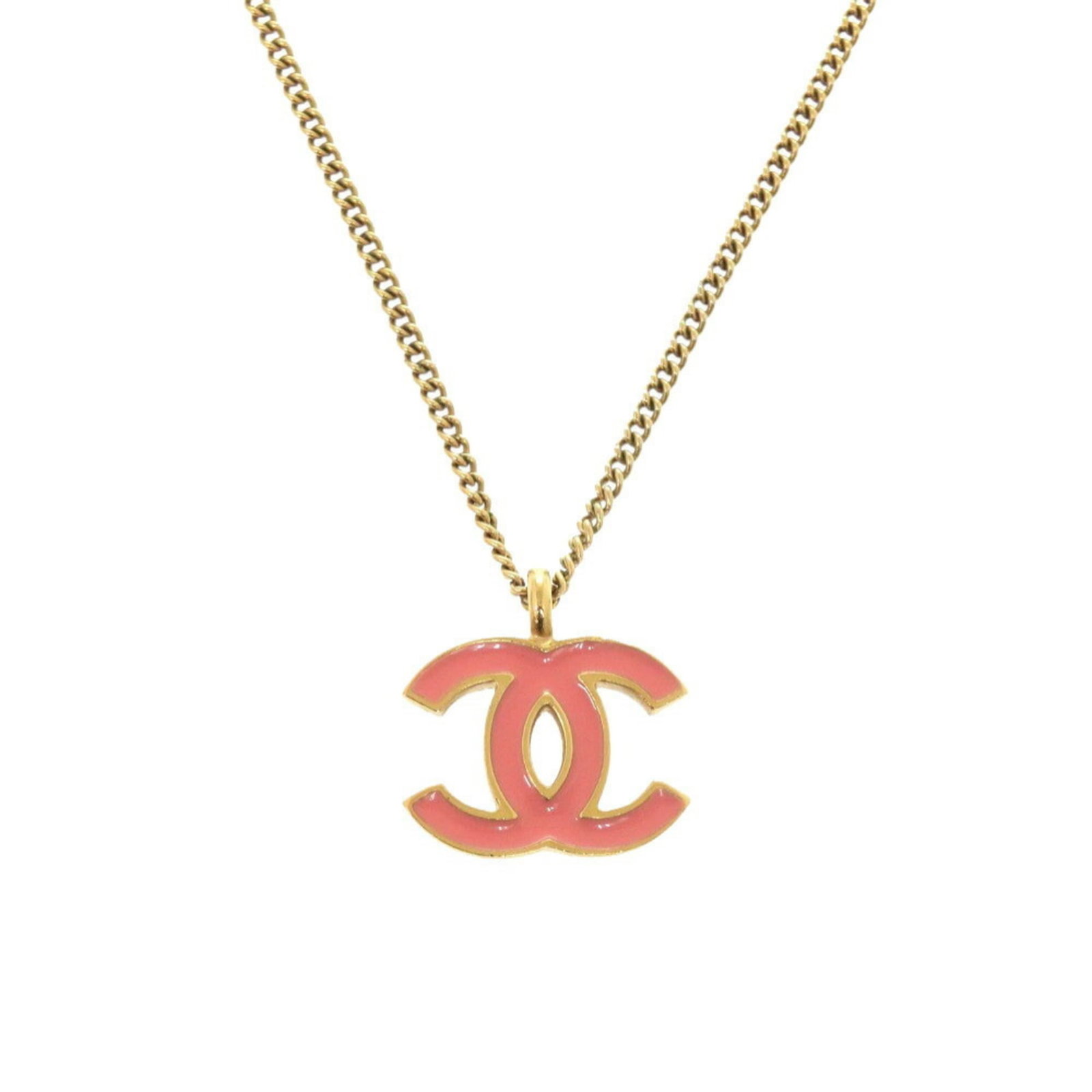 Metal Chanel: Metal Chanel Chanel metal necklace for women, colored orange, with a pendant size of 12mm x 17mm, showing signs of usage. Item Specifics: Brand: Chanel Necklace Type: Necklace Gender: Women