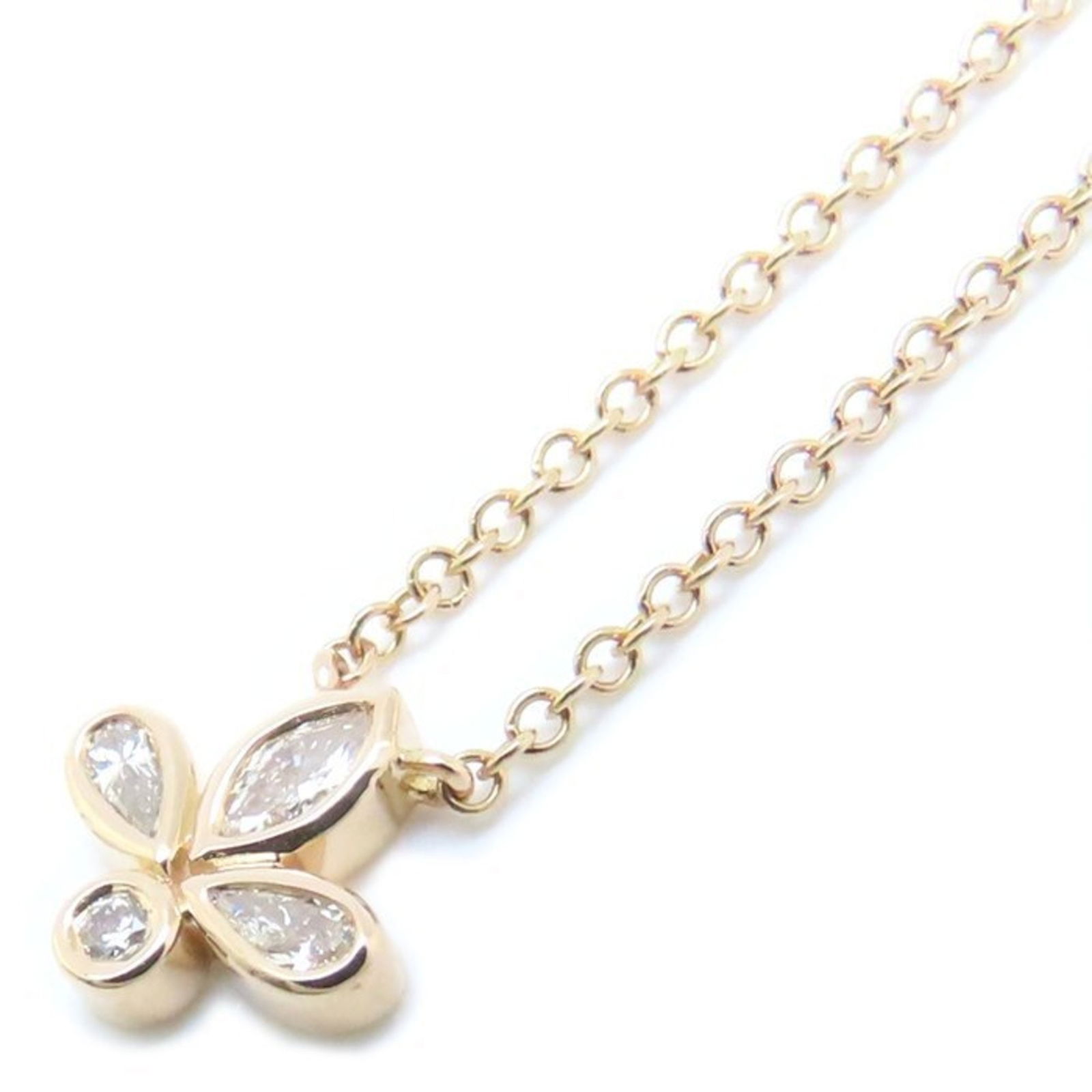 Pink Gold (18K) Tiffany: Pink Gold (18K) Tiffany Tiffany Necklace in 18K pink gold, with a neck circumference of 40.5 cm and a pendant size of 7.3mm x 7.6mm, is in like new condition. Item Specifics: Brand: Tiffany Necklace