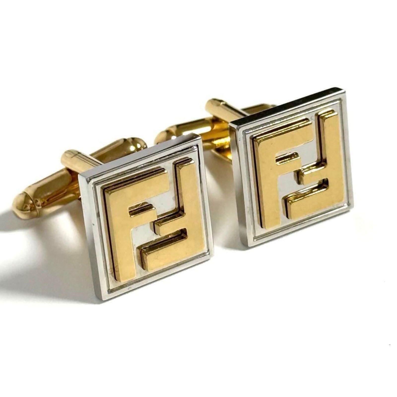Fendi Metal Cufflinks: Fendi Metal Cufflinks These Fendi metal cufflinks measure 15.00mm by 15.00mm and are in very good condition with minor traces of usage. Item Specifics: Brand: Fendi Type: Cufflinks Gender: Men