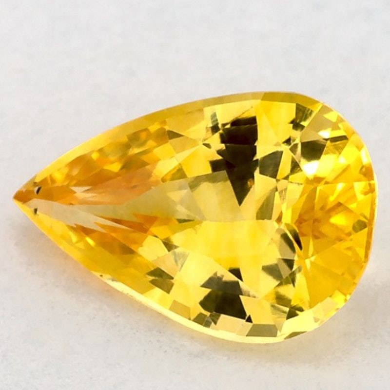 Loose Sapphire Gemstone 1.06ct Yellow Pear: Loose Sapphire Gemstone 1.06ct Yellow Pear Loose Pink Oval Sapphire Gemstone weighing 1.16ct, faceted and showing purplish pink color, with no treatment and no certification. Item Specifics: Type: