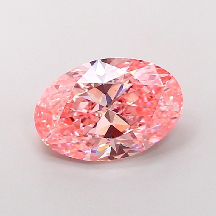 Loose Lab Diamond IGI Oval 3.0ct Fancy Vivid Pink VS2: Loose Lab Diamond IGI Oval 3.0ct Fancy Vivid Pink VS2 This loose 3.0ct lab-grown oval diamond, certified by IGI, exhibits a fancy vivid pink color and VS2 clarity. It features good polish and very