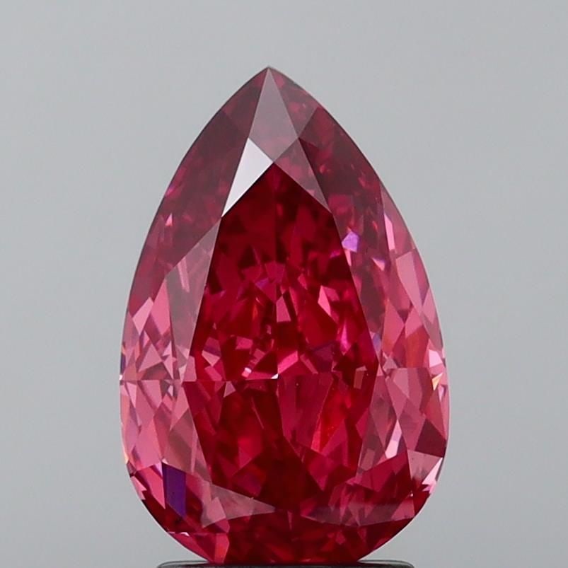 Loose Lab Diamond IGI Pear 3.23ct Fancy Vivid Pink VS1: Loose Lab Diamond IGI Pear 3.23ct Fancy Vivid Pink VS1 Loose lab-grown diamond weighing 3.23ct, with a fancy vivid pink color, VS1 clarity, certified by IGI, and measuring 11.99L x 7.73W x 4.69H. 