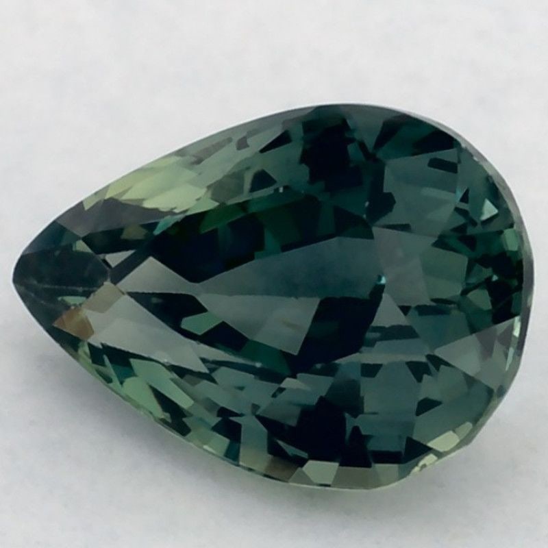 Loose Sapphire Gemstone 1.04ct Green EC - Pear: Loose Sapphire Gemstone 1.04ct Green EC - Pear Loose green sapphire gemstone weighing 1.04ct, faceted with a heated treatment. It measures 6.99L x 5.04W and has no certification. Item Specifics: Type: