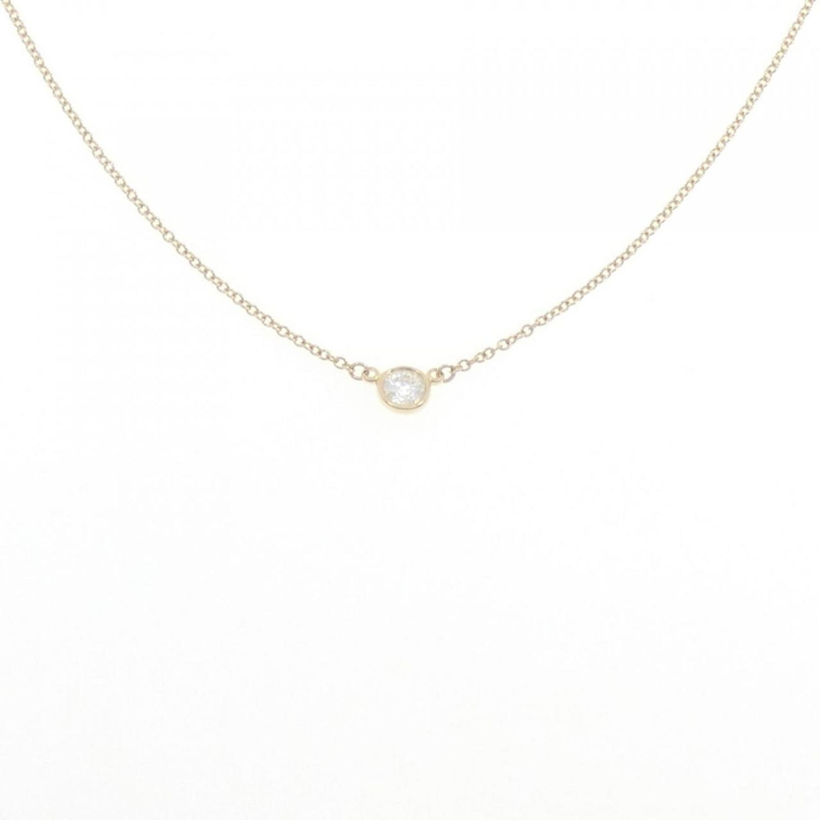 Yellow Gold (18K) Tiffany: Yellow Gold (18K) Tiffany Tiffany necklace made of 18K yellow gold, featuring a diamond, with a circumference of 41 cm and in very good used condition. Item Specifics: Brand: Tiffany Necklace Type: