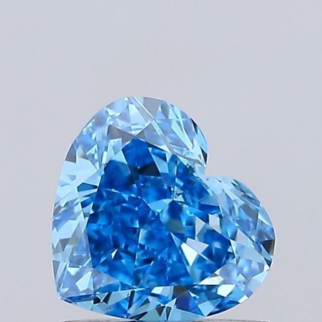 Loose Lab Diamond IGI Heart 1.01ct Fancy Vivid Blue VS1: Loose Lab Diamond IGI Heart 1.01ct Fancy Vivid Blue VS1 Loose lab-grown diamond IGI heart shape weighs 1.01 carats, classified as fancy vivid blue VS1 with measurements of 5.96L x 6.57W x 3.54H,