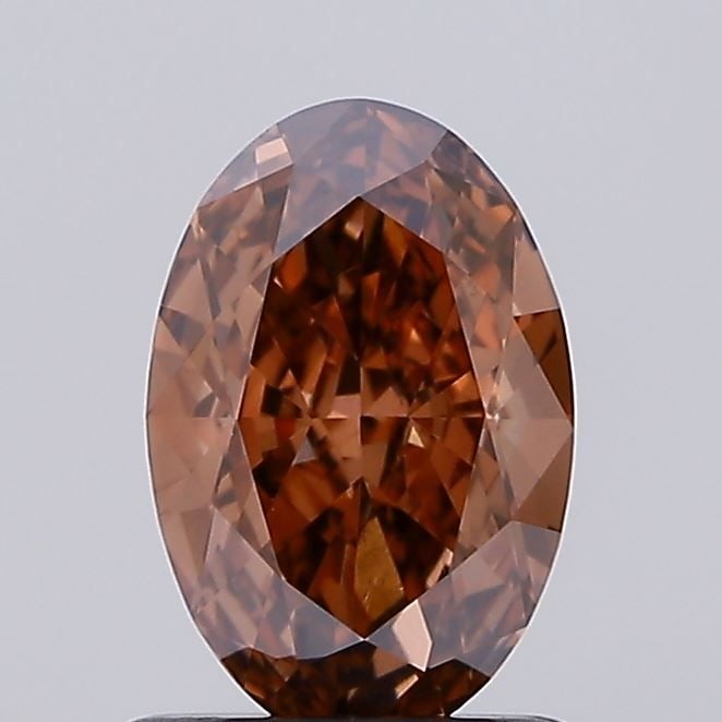 Loose IGI Oval 1.2ct Fancy Brown VVS2 Lab Diamond: Loose IGI Oval 1.2ct Fancy Brown VVS2 Lab Diamond Loose IGI oval lab diamond weighs 1.2 carats, classified as fancy brown VVS2 with measurements of 8.17L x 5.43W x 3.41H, certified by IGI. Item