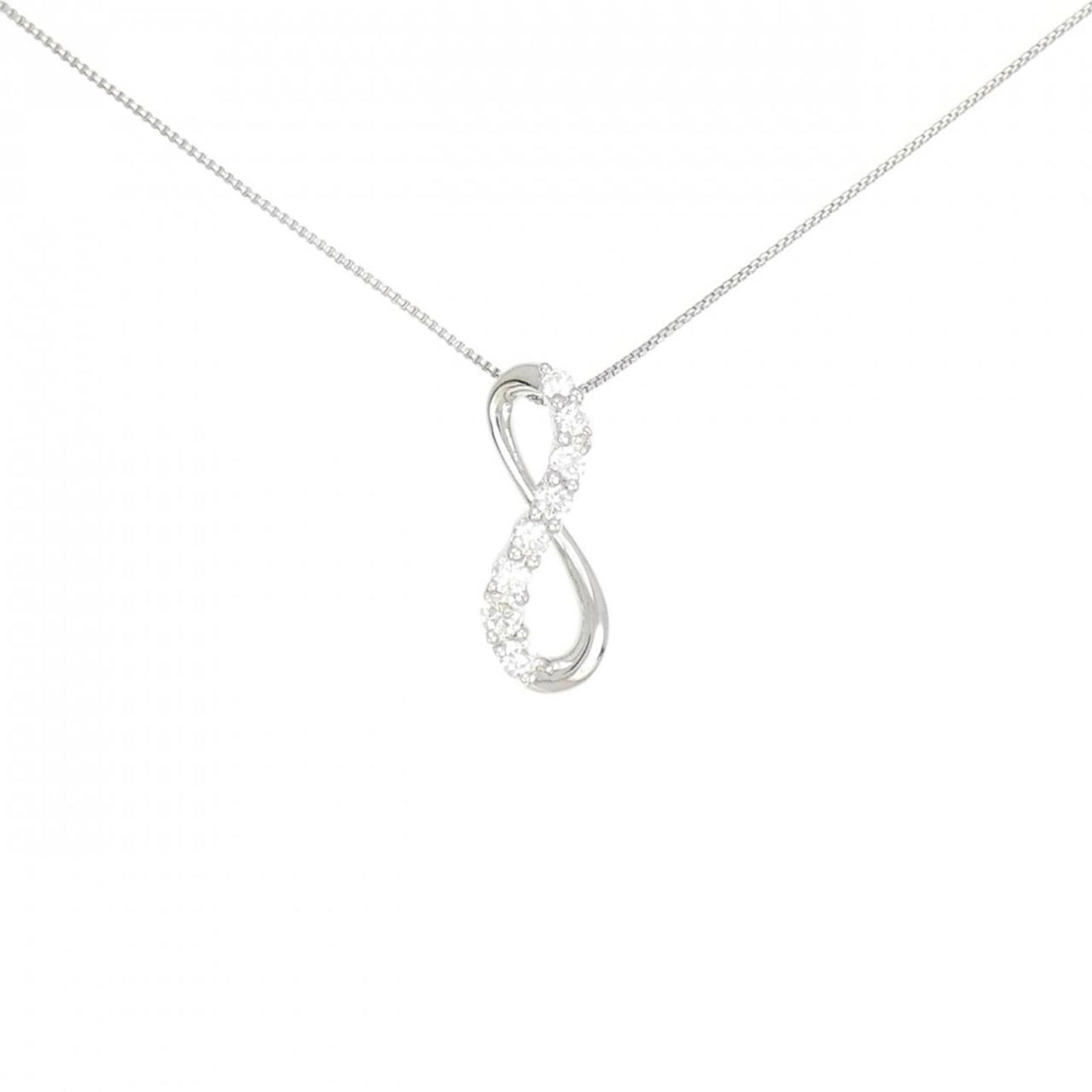 Aoyama Vendome Platinum: Aoyama Vendome Platinum Vendome Aoyama Platinum Necklace with a diamond pendant weighing 0.28ct, measuring 18.6mm x 7.2mm, in very good used condition. Item Specifics: Brand: Vendome Aoyama Necklace