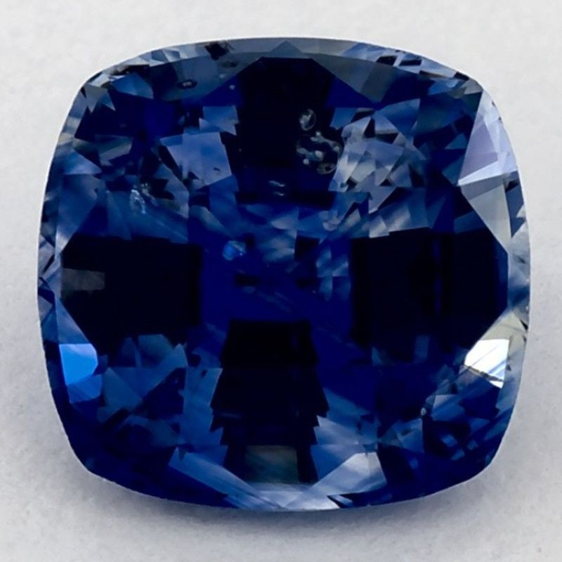 Loose Sapphire Gemstone 2.55ct Blue SI Cushion: Loose Sapphire Gemstone 2.55ct Blue SI Cushion This loose sapphire gemstone weighs 2.55ct, has a faceted blue color with SI clarity, is heated, and measures 8.03L x 7.75W mm, with no certification. It