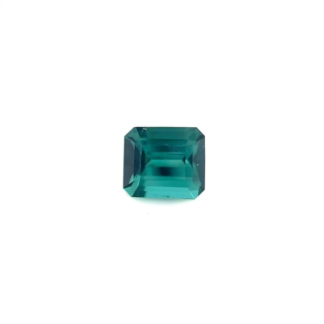 Loose Tourmaline Gemstone 1.85ct Blue SI - Emerald: Loose Tourmaline Gemstone 1.85ct Blue SI - Emerald Loose blue tourmaline gemstone weighing 1.85ct, with SI clarity and no treatment, cut in an emerald shape. Its dimensions are 7.5L x 6.5W and it is u