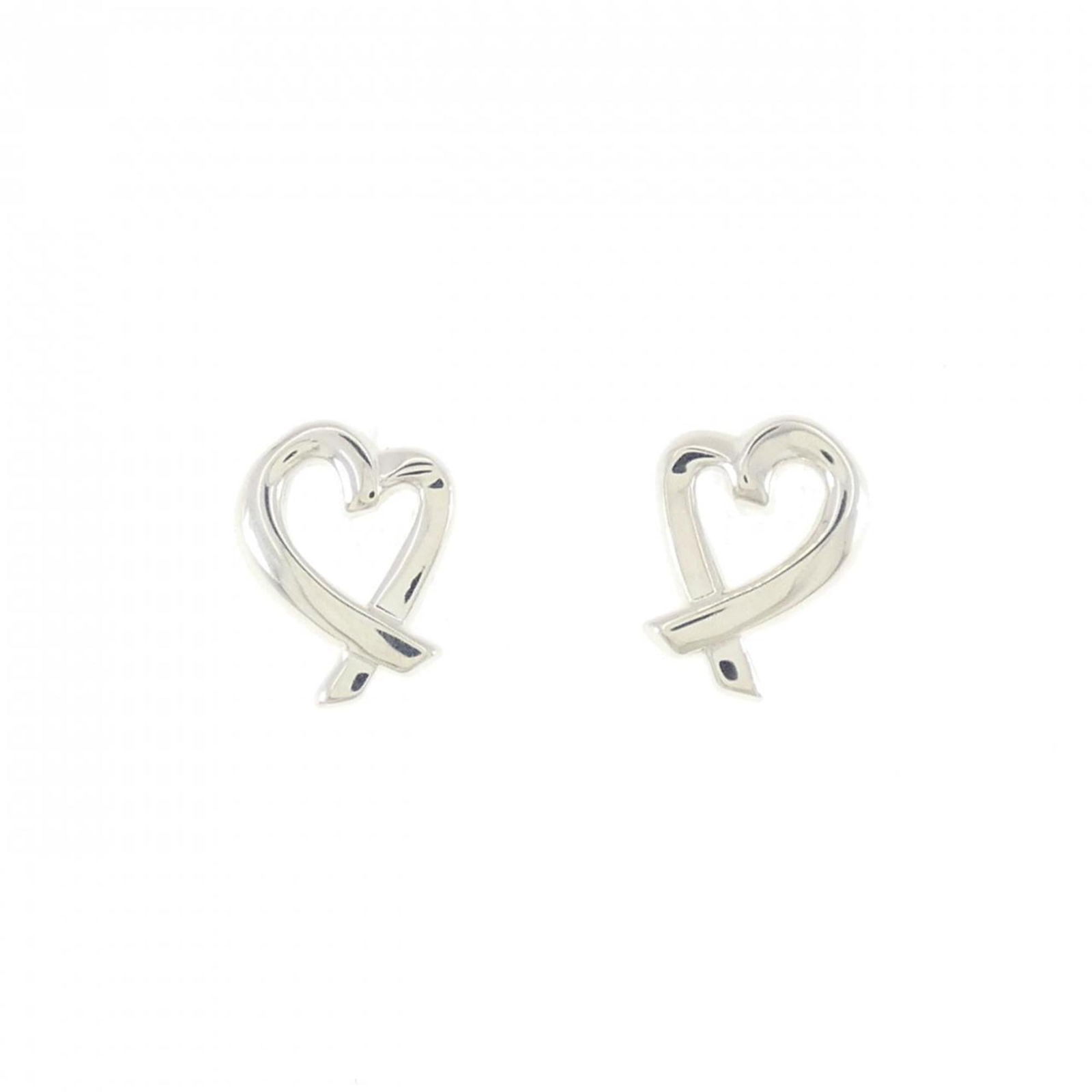 Tiffany Silver 925 Stud Earrings: Tiffany Silver 925 Stud Earrings Tiffany & Co. silver 925 stud earrings measuring 10.50mm x 7.90mm, in acceptable used condition with traces of usage. Item Specifics: Brand: Tiffany Type: Stud