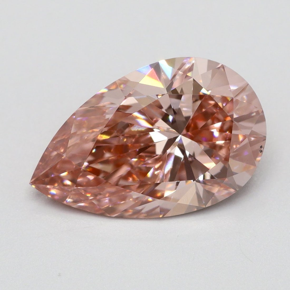 Loose Lab Diamond 1.59ct Pear Fancy Vivid Pink VS2: Loose Lab Diamond 1.59ct Pear Fancy Vivid Pink VS2 Loose lab diamond weighing 1.59ct in a pear shape, fancy vivid pink color, VS2 clarity, with good polish and symmetry; measures 10.3L x 6.5W x 3.95H.