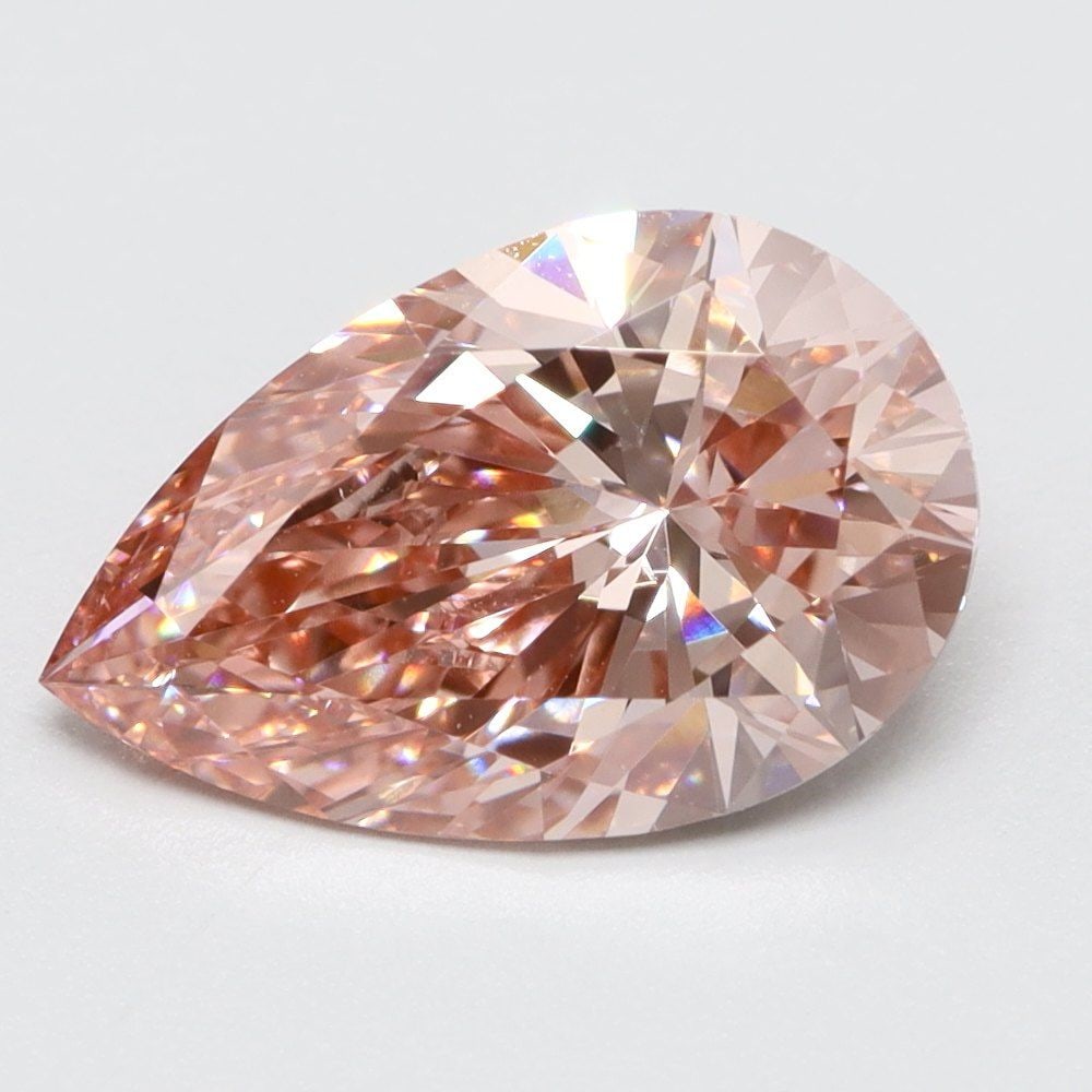 Loose Lab Diamond 1.1ct Fancy Vivid Pink VS1 - Pear: Loose Lab Diamond 1.1ct Fancy Vivid Pink VS1 - Pear This loose lab-grown diamond weighs 1.1 carats, is fancy vivid pink in color with VS1 clarity, featuring very good polish and symmetry, and has no c