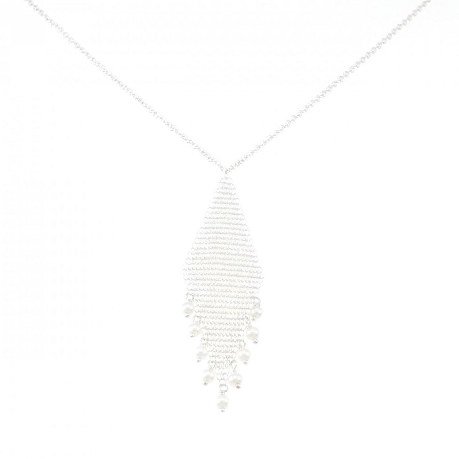 Silver 925 Tiffany: Silver 925 Tiffany 925 silver necklace by Tiffany for women, featuring a pendant sized 58.8mm x 16.3mm, in very good used condition. Item Specifics: Brand: Tiffany Necklace Type: Necklace Pendant