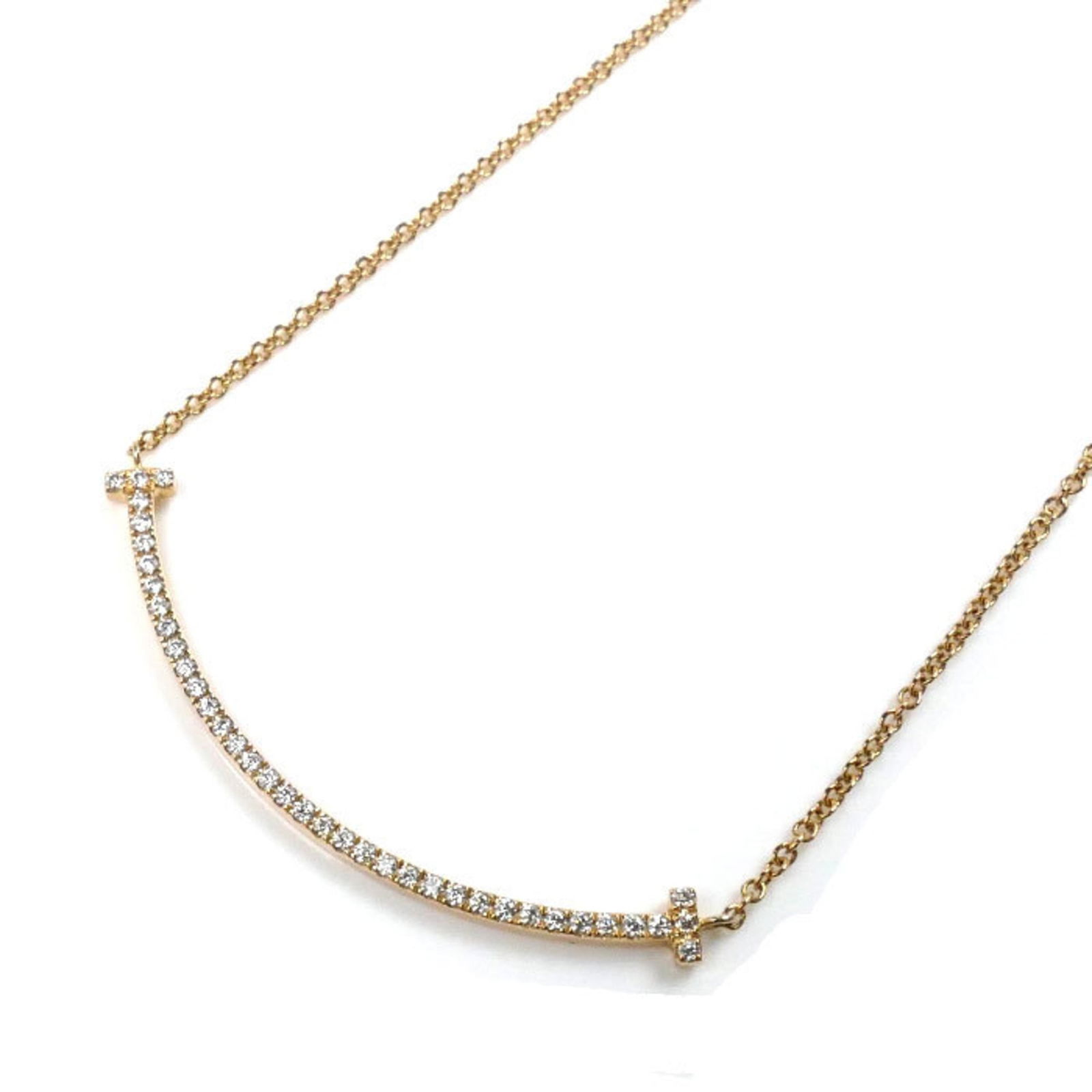 Pink Gold (18K) Tiffany: Pink Gold (18K) Tiffany This Tiffany necklace is made of 18K pink gold, has a neck circumference of 40.5 cm (15.94 inches), and a pendant size of 37mm (1.45 inches), in good used condition with signs